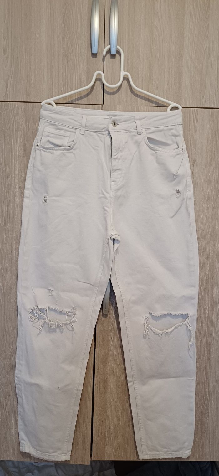 Pantalon femme , trous un peut élargie
