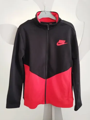 Veste zippée noir et rouge Nike taille 10 ans
