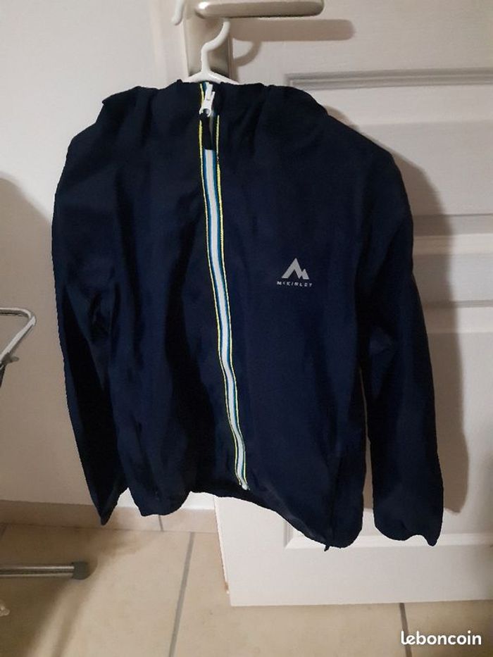 Veste de pluie / coupe-vent bleu marine / 10 ans / MC Kinley
