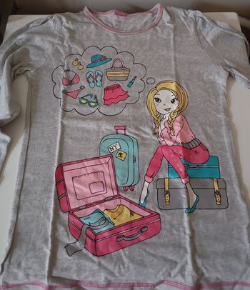 Tee-shirt manches longues. 9/10 ans. 134/140 cm. Coton gris clair chiné. Dessins avec paillettes. État neuf