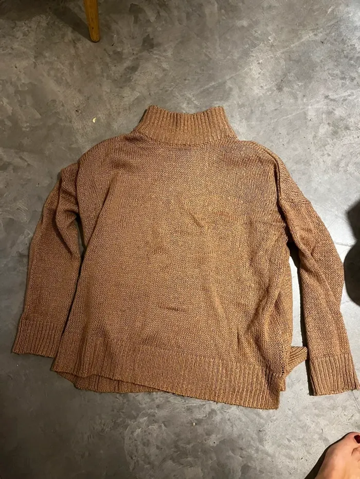 Pull col roulé