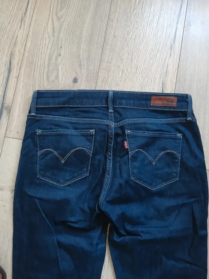 Jean levis 28x32 demi curve bootcut skinny bleu brut FR38 modern rise bleu