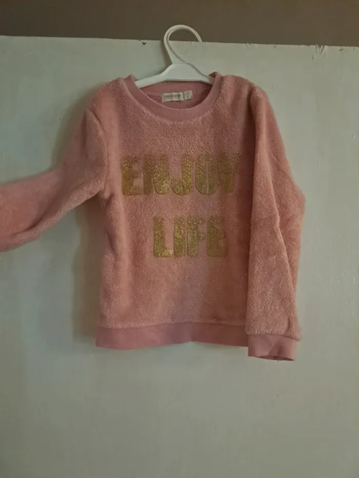 Pull rose et doré orchestra