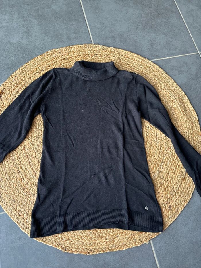 Pull col roulés