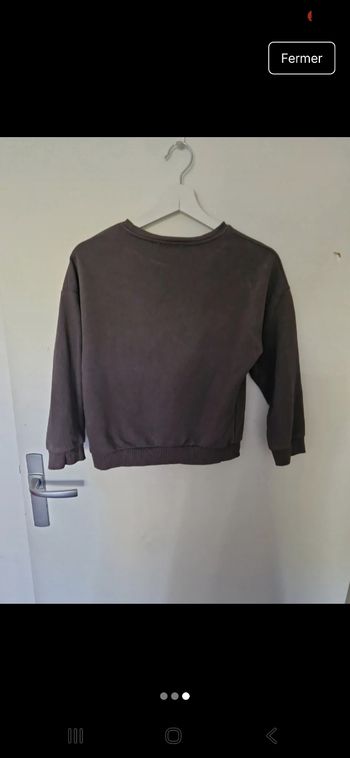 Pull noir/gris avec motifs