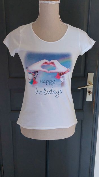 T-shirt pour fille taille 14 ans (tbe)