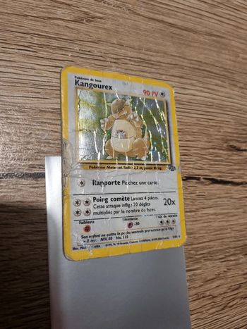 Carte pokémon kangourex HOLO 5/64 fr année 2000 jungle trés abîmé