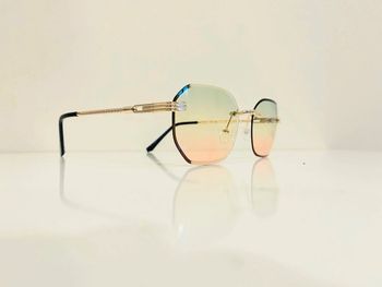 Lunette de soleil mixte percée dorée verres dégradés UV protection taille moyenne