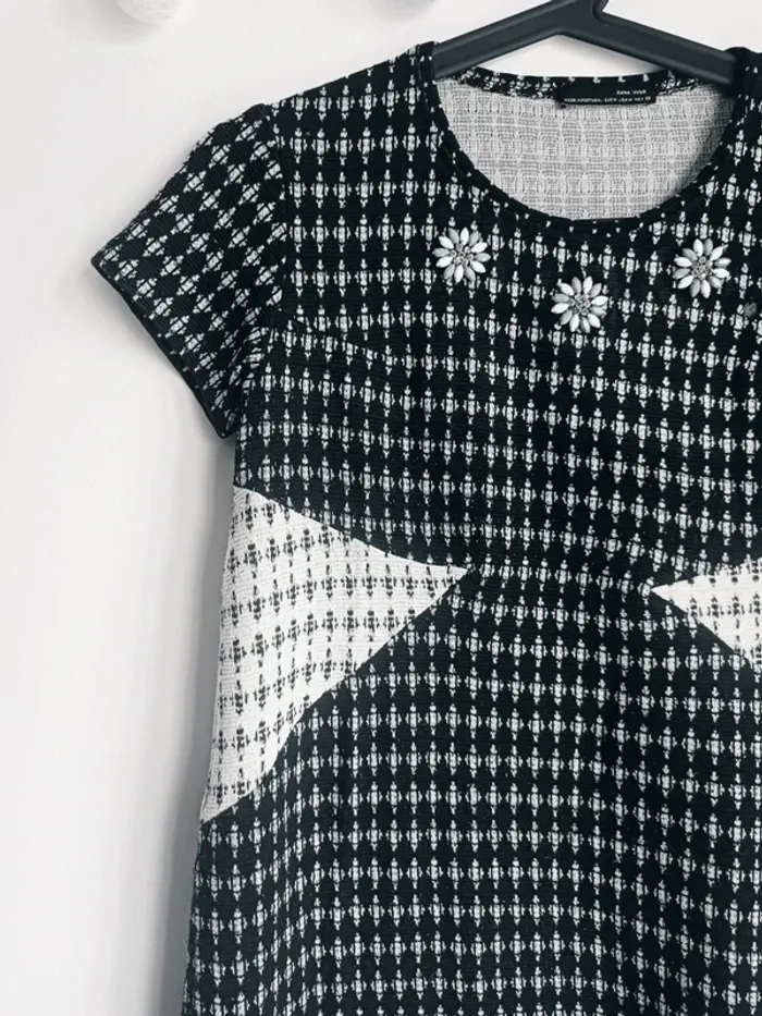 Robe noire et blanche à paillettes argentés Zara Taille M En très bon état