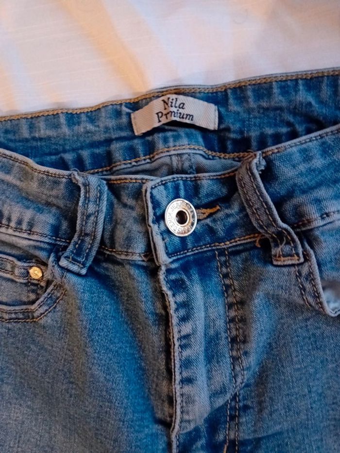 Jeans troué - photo numéro 2