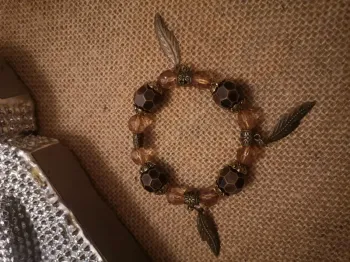 Bracelet marron breloque