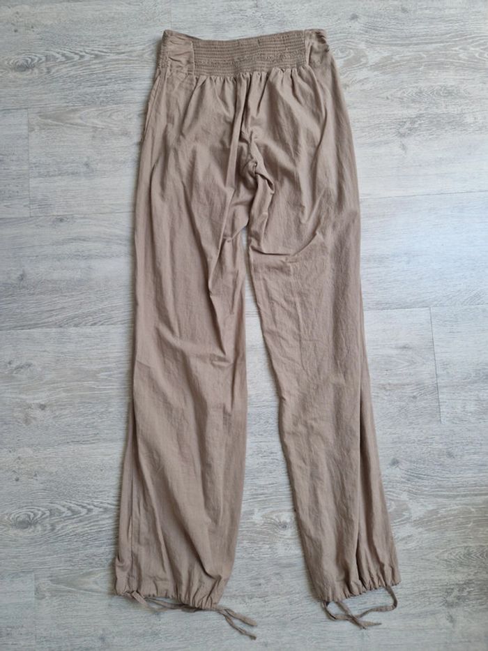 Pantalon fin beige Promod Étiquette de taille coupée mais convient à un XS - photo numéro 8