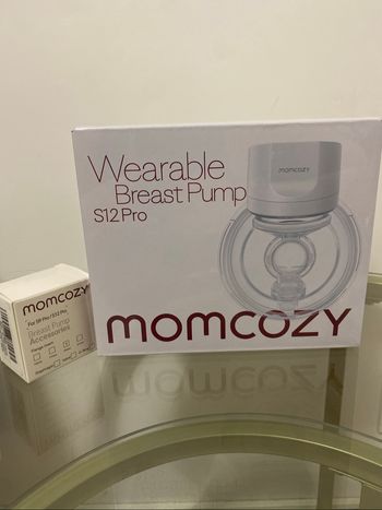 tire lait momcozy
