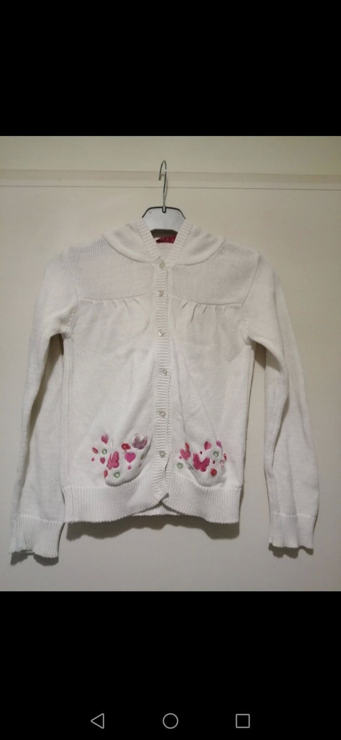 Gilet à capuche blanc. Taille 8ans