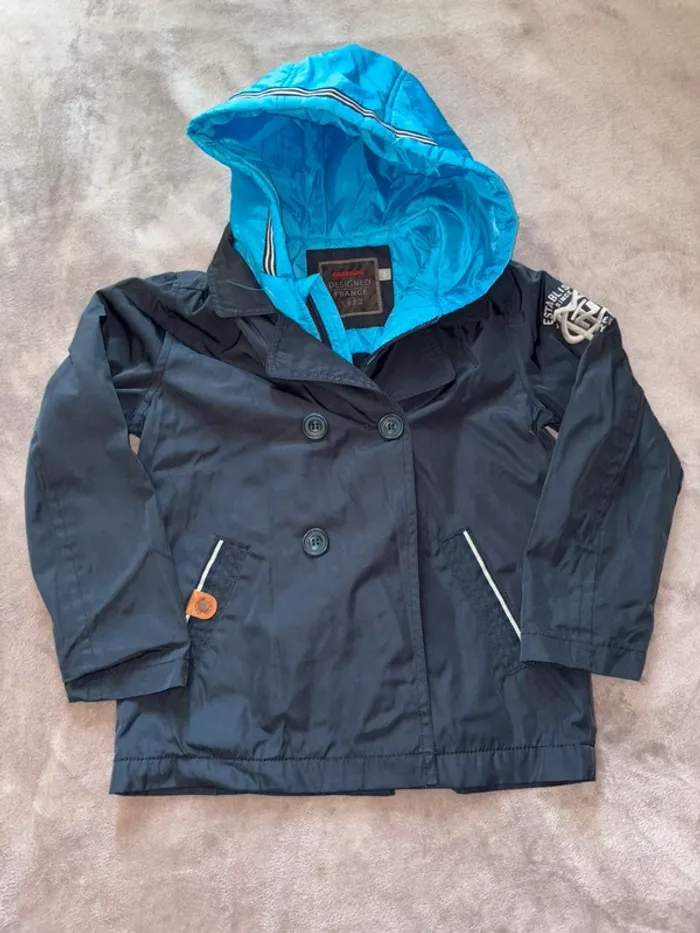 Blouson imperméable garçon catimini taille 6 ans en très bon état. Bleu ciel et bleu marine. - photo numéro 6