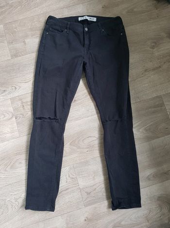 Primark - Jean noir troué aux genoux