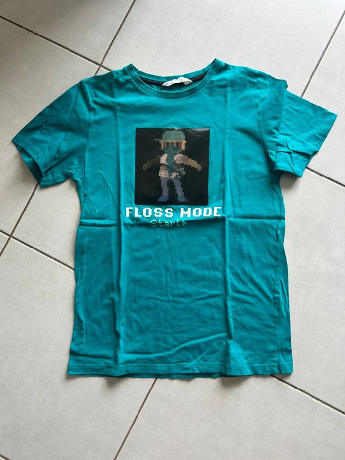 Tee shirt manches courtes H&M 12 ans turquoise à motif