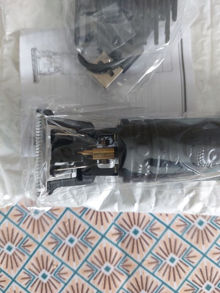 Tondeuse à cheveux noir motif bouhda - photo numéro 4