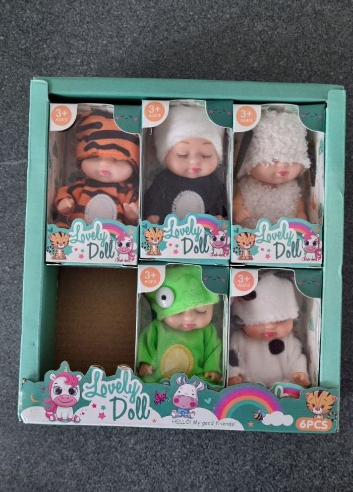Bébé poupée lovely doll - 1 au choix