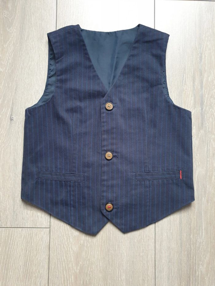 Bolero bleu a rayures. Garçon 6 ans