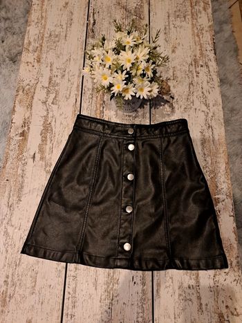 Jupe simili cuir à boutons