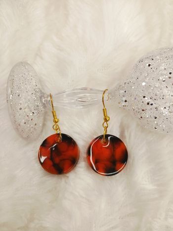 Boucles d'oreilles orange et noire 