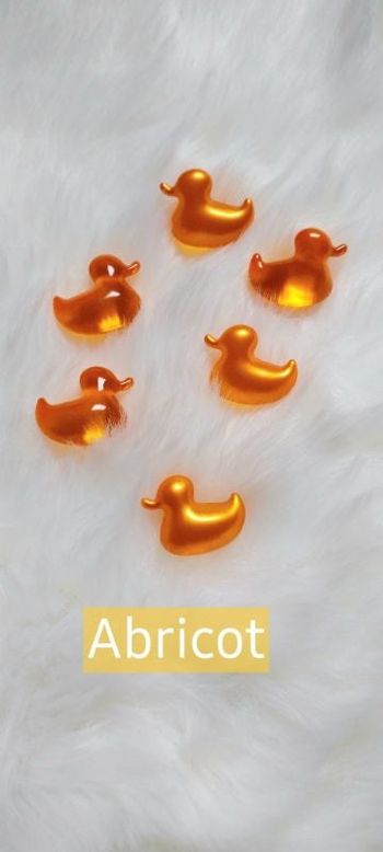 Perles de bain abricot