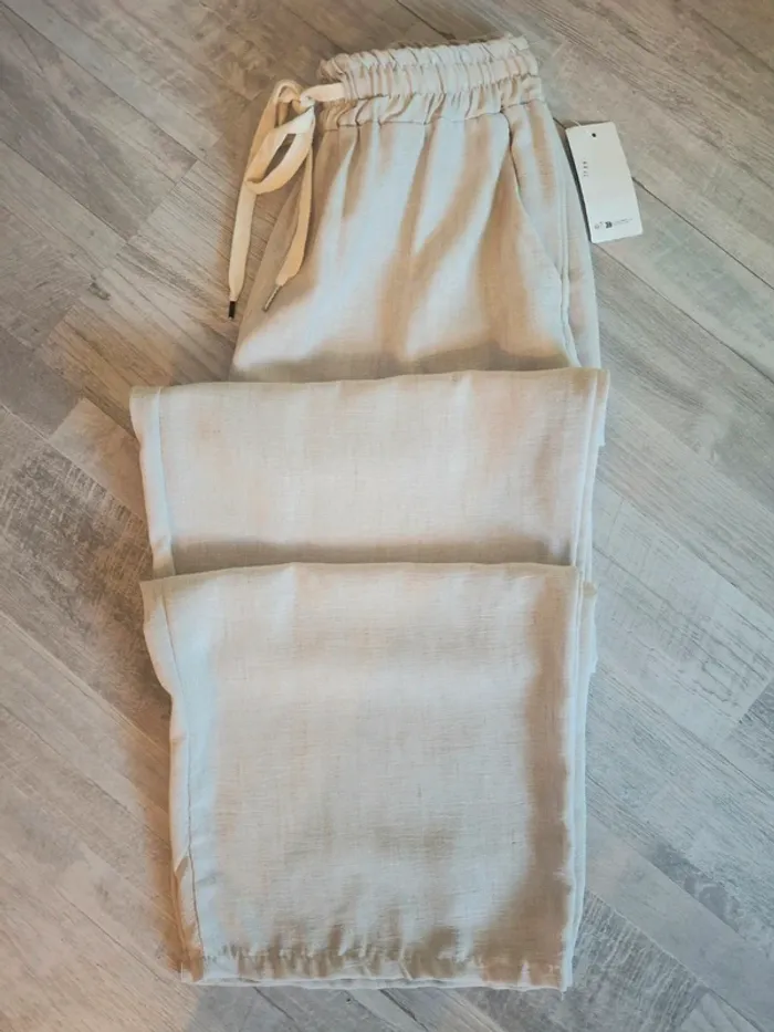 Pantalon palazzo beige