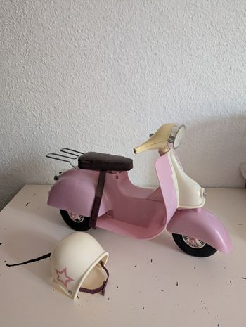 Scooter rose pour poupon