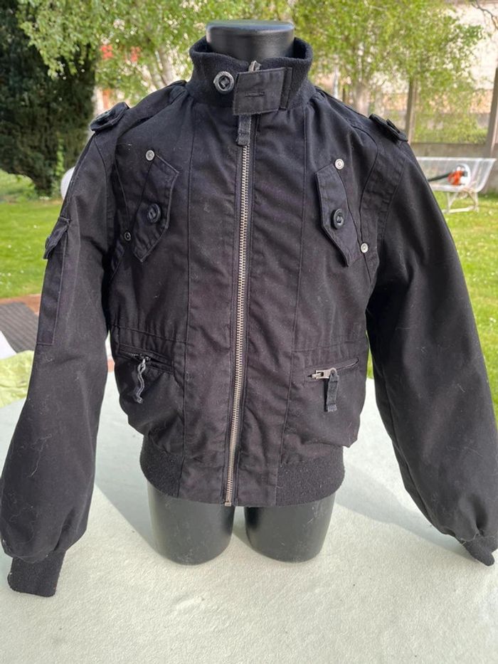 Blouson noir Teddy smith taille 8 ans