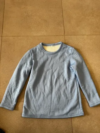 Pull pyjama bleu clair taille S, très bon état pour femme