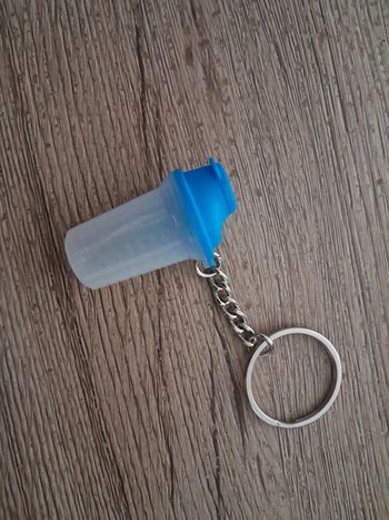 Porte-clef "Shaker" avec couvercle amovible - Tupperware