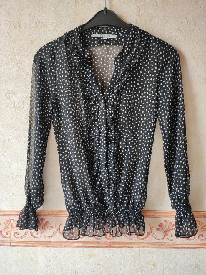 Blouse noire à pois