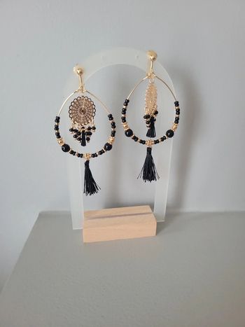 Clips "attrape rêves " acier gold et noir.