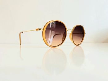 Lunette de soleil femme ovale abricot et dorée verres dégradés UV protection catégorie 2