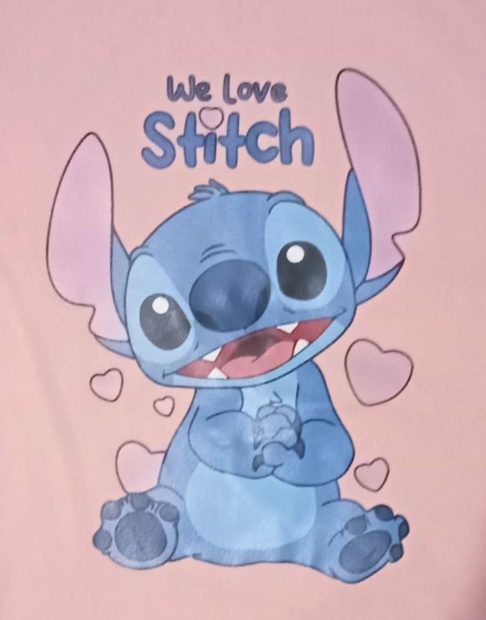 Pull  polaire neuf 10 ans  Stitch