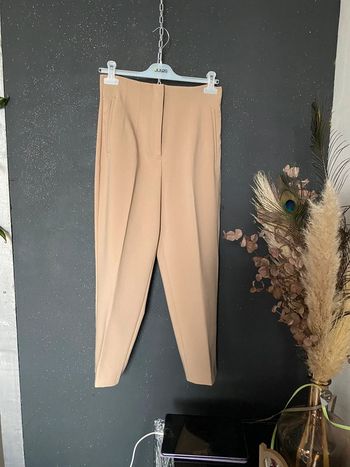 Pantalon beige large aux cuisses comme neuf