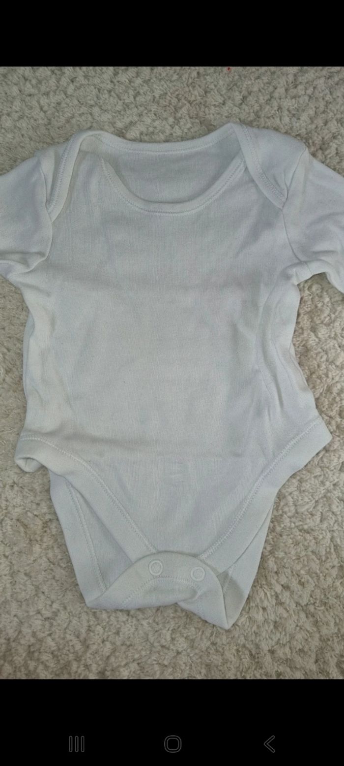 Body manche longue 0/3 mois en très bon état