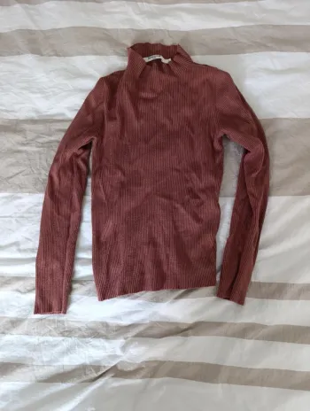 Pull col roulé