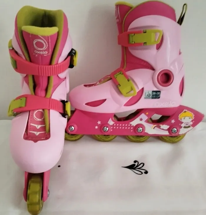 Roller rose évolutif thème princesse en ligne 4 roues Decathlon taille 28-30 - photo numéro 4