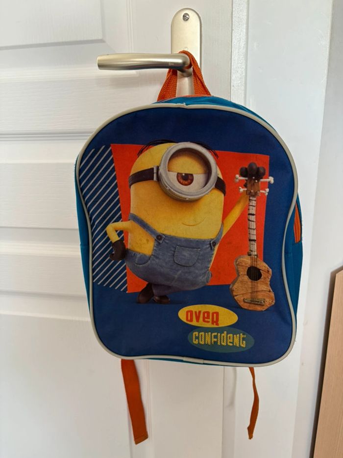 Sac à dos bleu Minion à fermeture orange bon état💙