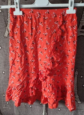 Jupe rouge fleurie 8ans