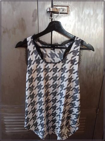 Débardeur H&M taille 36 bon état noir et blanc