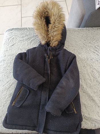 Manteau tape à l'oeil