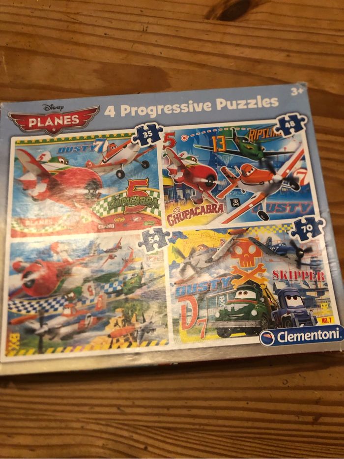 1 boîte de puzzle planes avec 4 puzzles