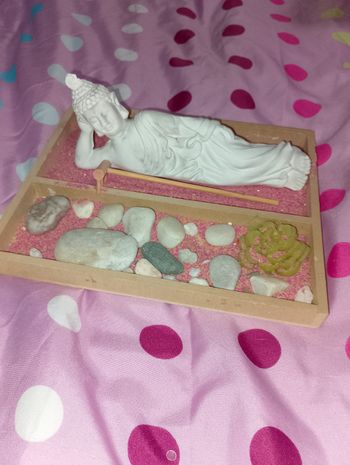 Décoration bouddha allongé