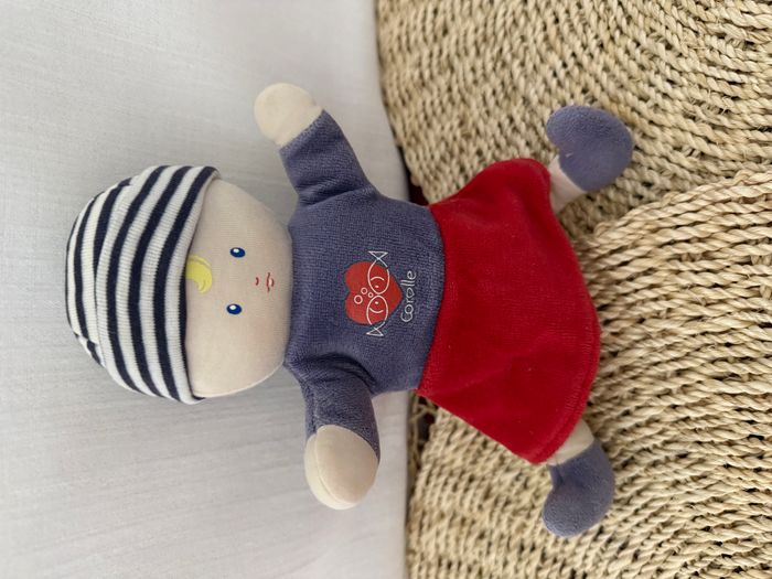 Doudou poupée fille bleu marin jupe rouge poisson COROLLE