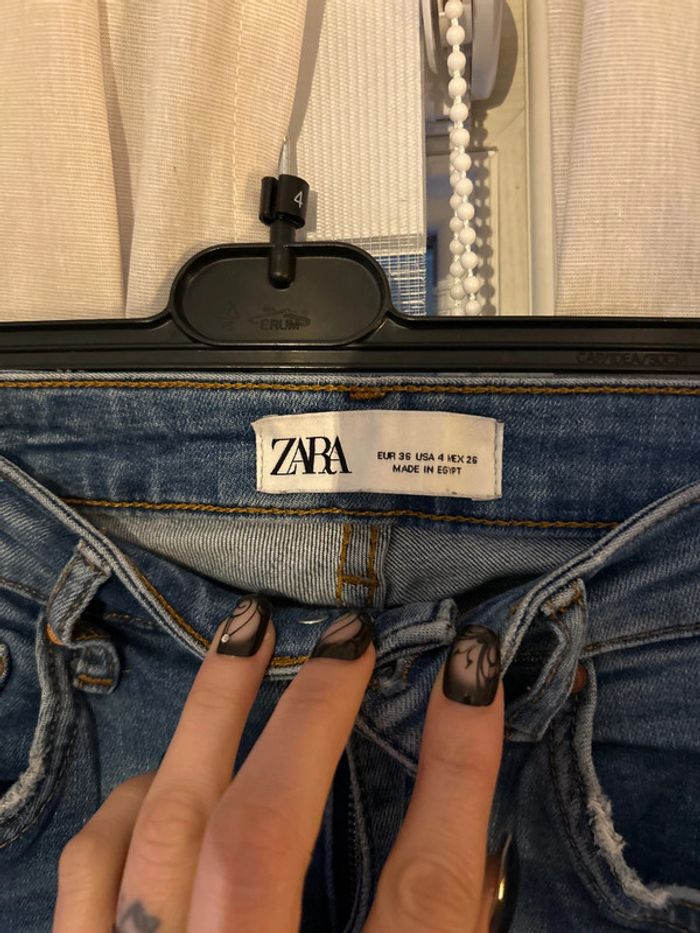 Jeans trouée - photo numéro 3
