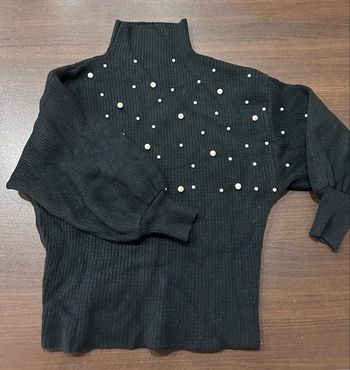 Pull col roulé noir à perles