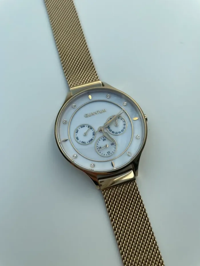 Montre doré quantum - photo numéro 2